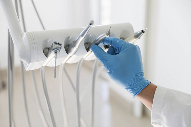 Professional Tooth Extraction technician working in Covington, IN